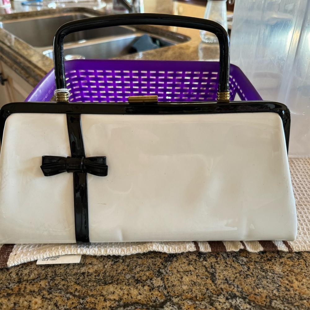 Vintage White purse with black bow. Approx 10” x 6”